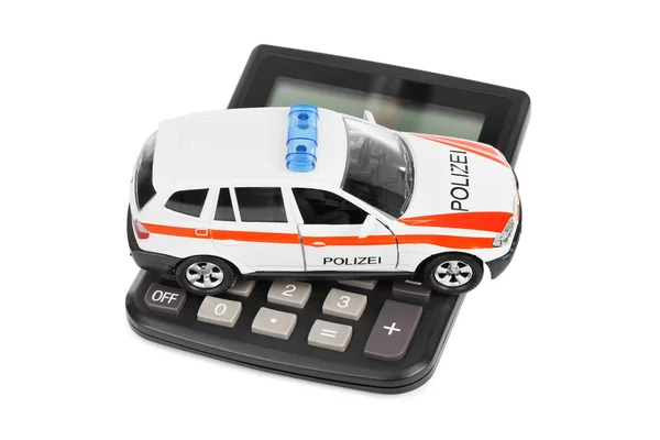 Calculadora e brinquedo carro da polícia — Fotografia de Stock