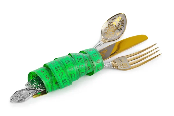 Cuchillo cuchara tenedor y cinta métrica —  Fotos de Stock