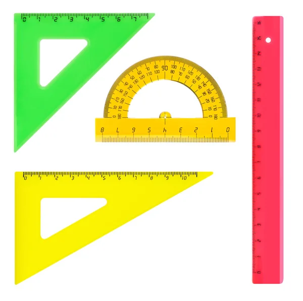 Reglas multicolores aisladas sobre fondo blanco —  Fotos de Stock