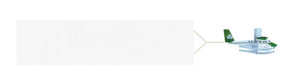 Летающий самолет и баннер — стоковое фото