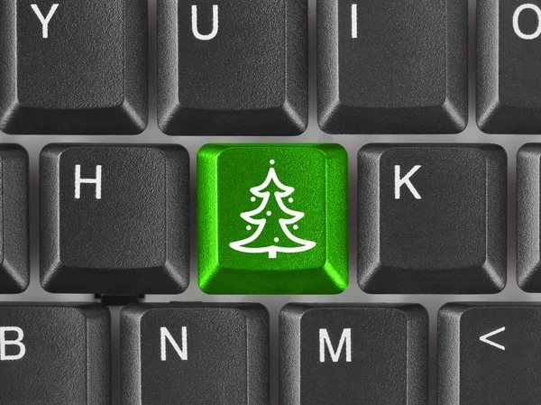 Papan tik komputer dengan kunci pohon Natal — Stok Foto