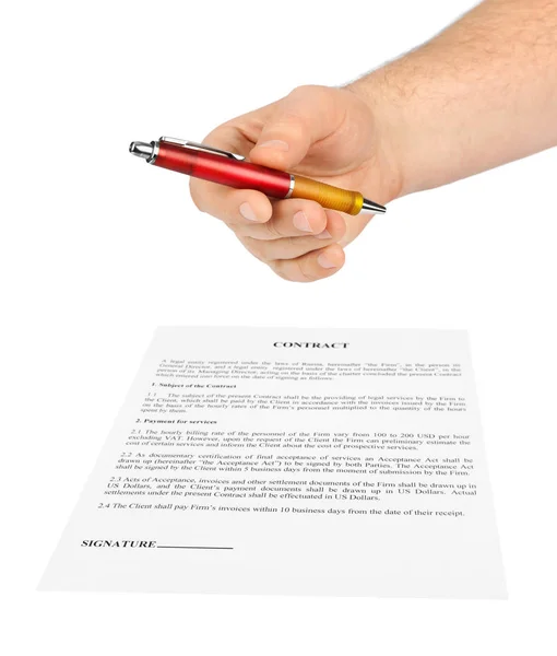 Рука с ручкой и контракт — стоковое фото