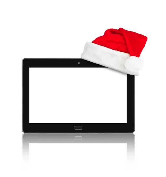 Touchpad pc en Santa Claus rode kerstmuts — Stockfoto