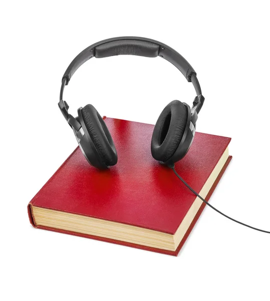 Auriculares y libro — Foto de Stock