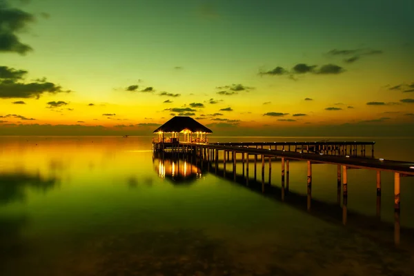 Water cafe at sunset - Maldives — Stock Photo, Image