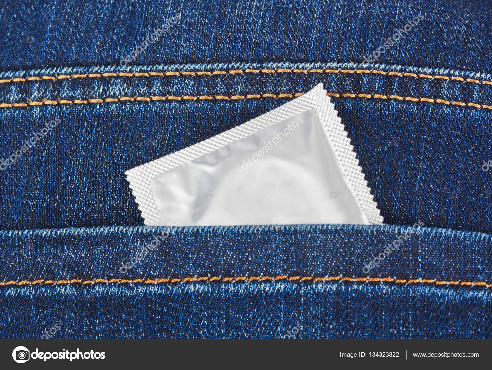 Condom in jeans pocket — Stock Photo © Violin 134323822