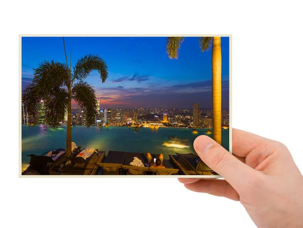 Hand and Singapore city skyline (my photo) — Stock Photo, Image