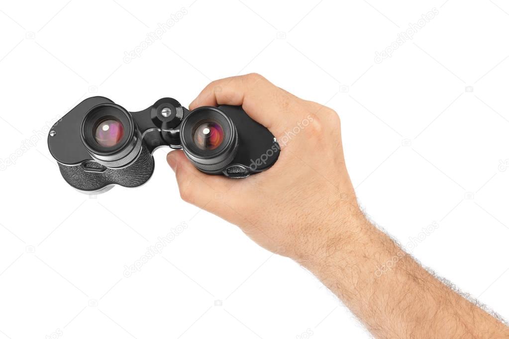Hand with binoculars