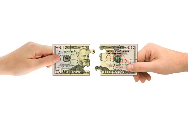 Hands and money puzzle — Stock Photo, Image
