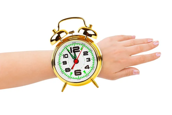 Mão e despertador como um relógio — Fotografia de Stock