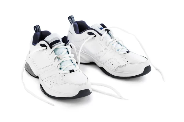 Спортивные кроссовки на белом фоне — стоковое фото
