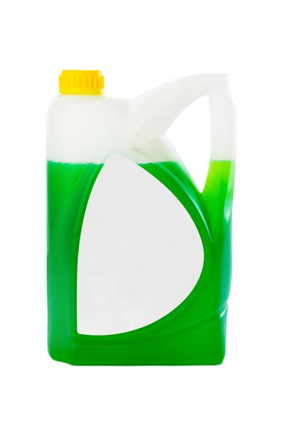 Tanica con liquido verde ed etichetta bianca — Foto Stock