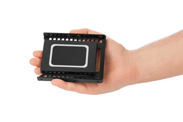 Unità SSD per mano e computer — Foto Stock