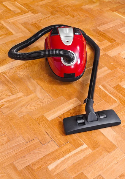 Aspirateur sur parquet — Photo