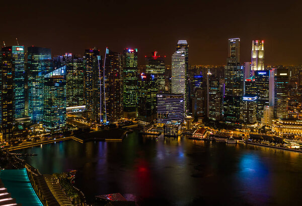 SINGAPORE - APRIL 14: Singapore city skyline and Marina Bay on April 14, 2016 in Singapore.