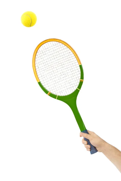 Hand met tennisracket en bal — Stockfoto