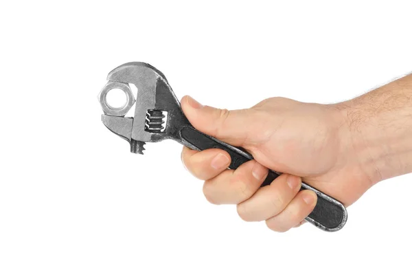 Adjustable spanner in hand — Stock Photo, Image