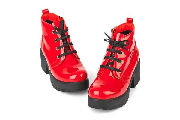 Красная обувь на белом фоне — стоковое фото