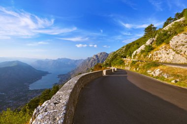 Mountains road and Kotor Bay on sunset - Montenegro clipart