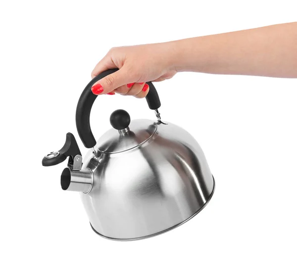 Stovetop whistling kettle in hand — Stock Photo, Image