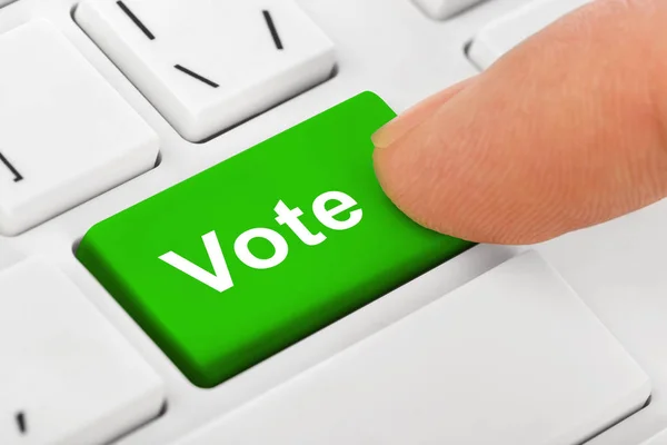 Computer notebook keyboard with Vote key — Stock Photo, Image