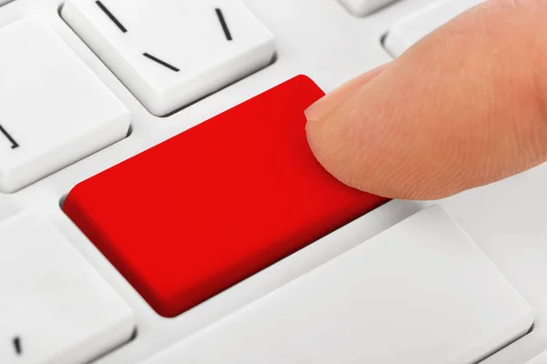 Ordenador teclado portátil con tecla roja en blanco —  Fotos de Stock