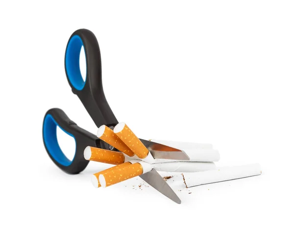 Scissors and cigarettes — Stock Photo, Image