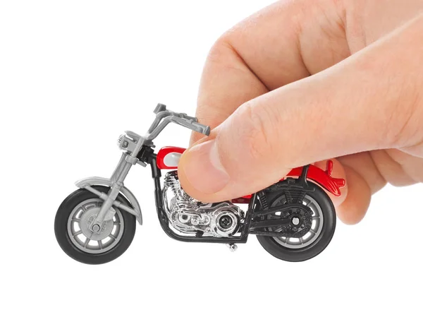 Hand with toy motorbike — Stock Photo, Image