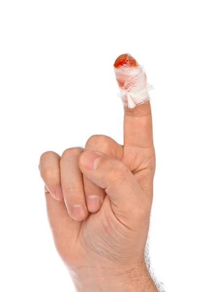 Hand med blod och bandage — Stockfoto