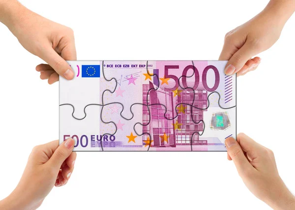 Hände und Geld Puzzle — Stockfoto