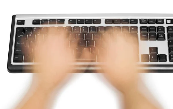 Комп'ютерна клавіатура та рухи розмивання рук — стокове фото