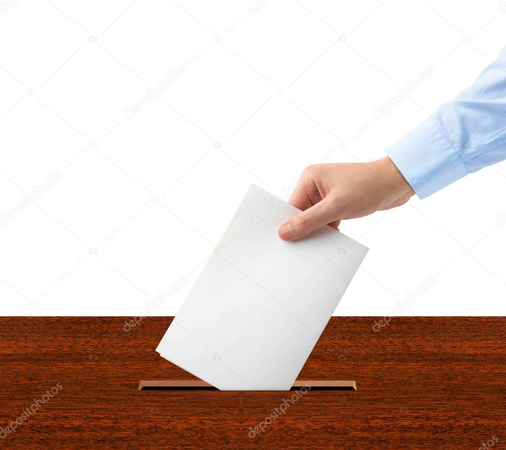 Hand with ballot and box