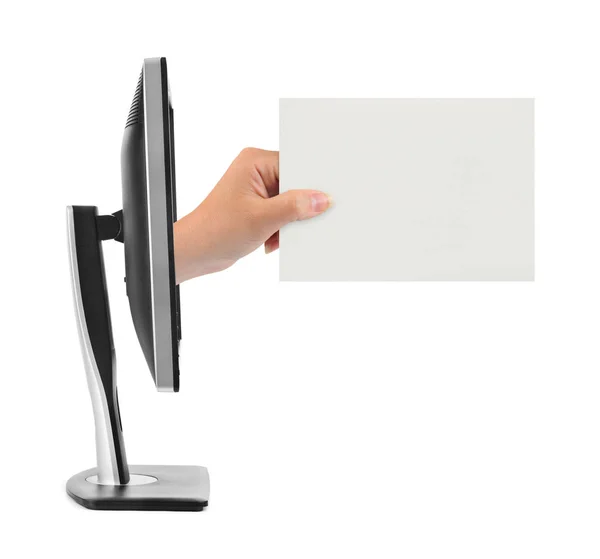 Hand with blank card and computer monitor — Stock Photo, Image