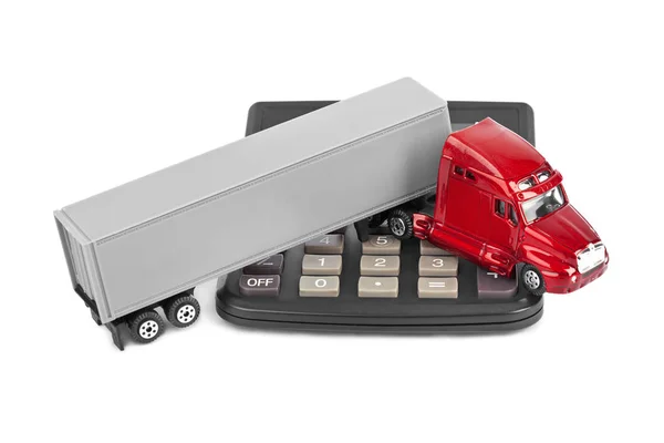 Kalkulator i zabawka samochód ciężarowy — Zdjęcie stockowe