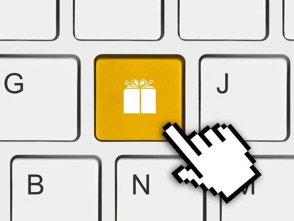 Počítačová klávesnice s klíčem dárek — Stock fotografie
