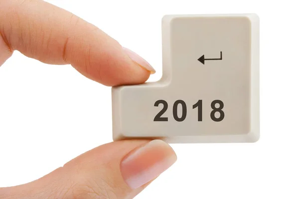 Počítač tlačítko 2018 v ruce — Stock fotografie