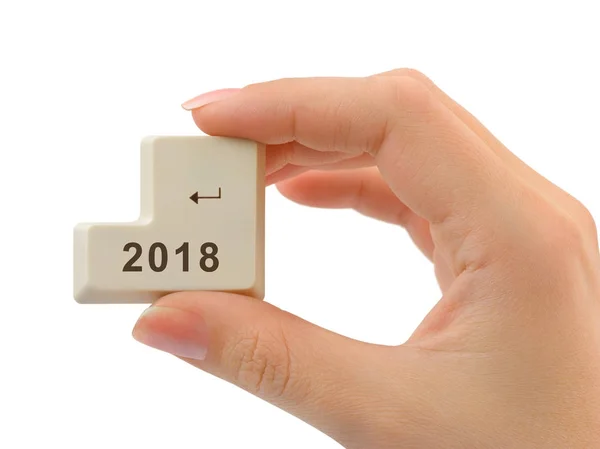 Computer button 2018 in hand — Stock Photo, Image