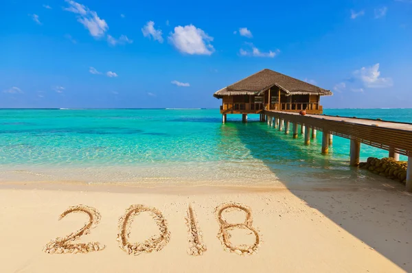 Номера 2018 на пляже — стоковое фото