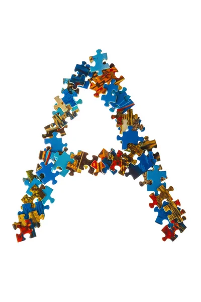 Letter A gemaakt van puzzelstukken — Stockfoto