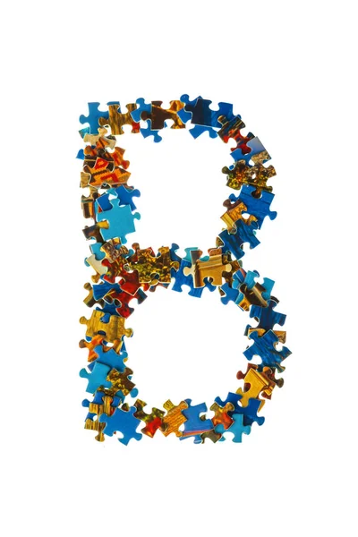 Carta B feita de peças de quebra-cabeça — Fotografia de Stock