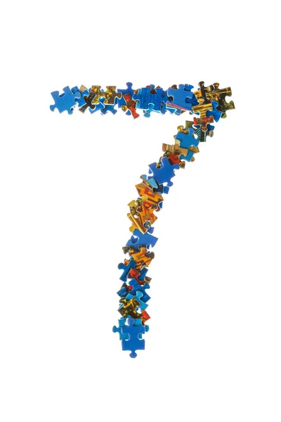 Number 7 made of puzzle pieces — Stock Photo, Image