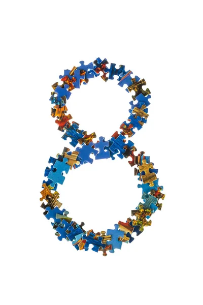 Number 8 made of puzzle pieces — Stock Photo, Image