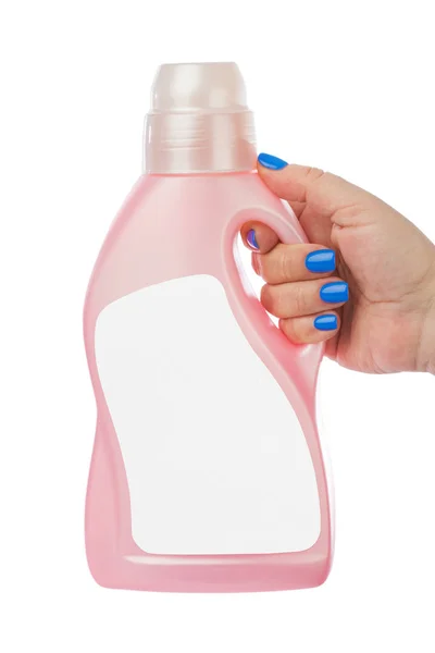 Hand and plastic bottle with blank label — Stock Photo, Image