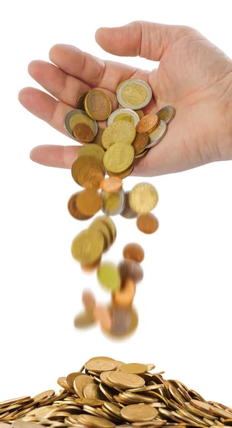 Hand and falling coins — Stock Photo, Image