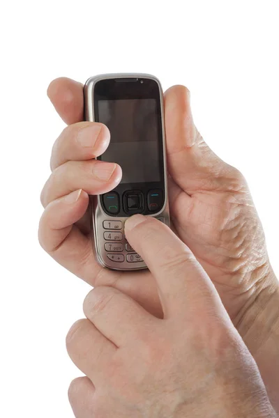 Hands of old man with old mobile phone — Stock Photo, Image