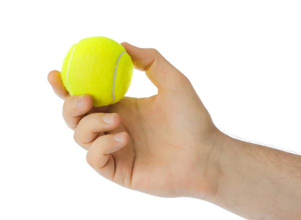 Ruka s tenisovým míčkem — Stock fotografie