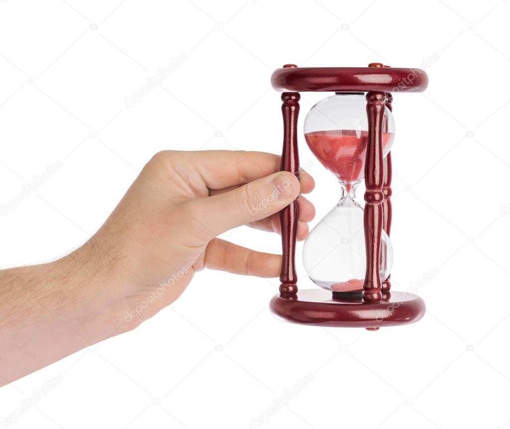 Hand with hourglass