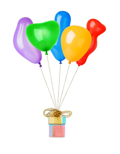 Воздушные шары и подарок — стоковое фото