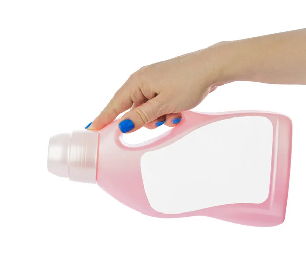 Hand and plastic bottle with blank label — Stock Photo, Image