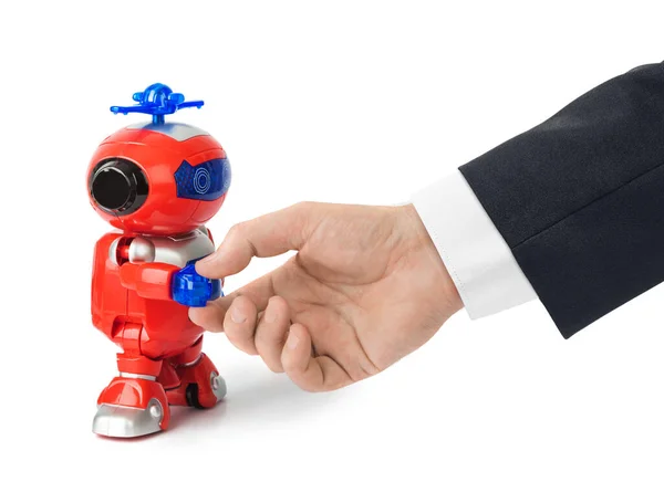 Рукопожатие с игрушечным роботом — стоковое фото
